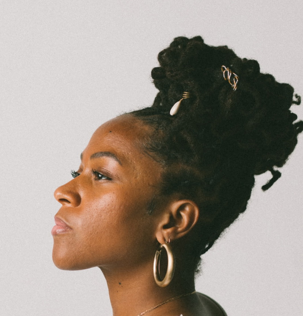 Beautiful loc updo with gold hair accessories — natural hair styling by True Head No Lye, Brooklyn loctician